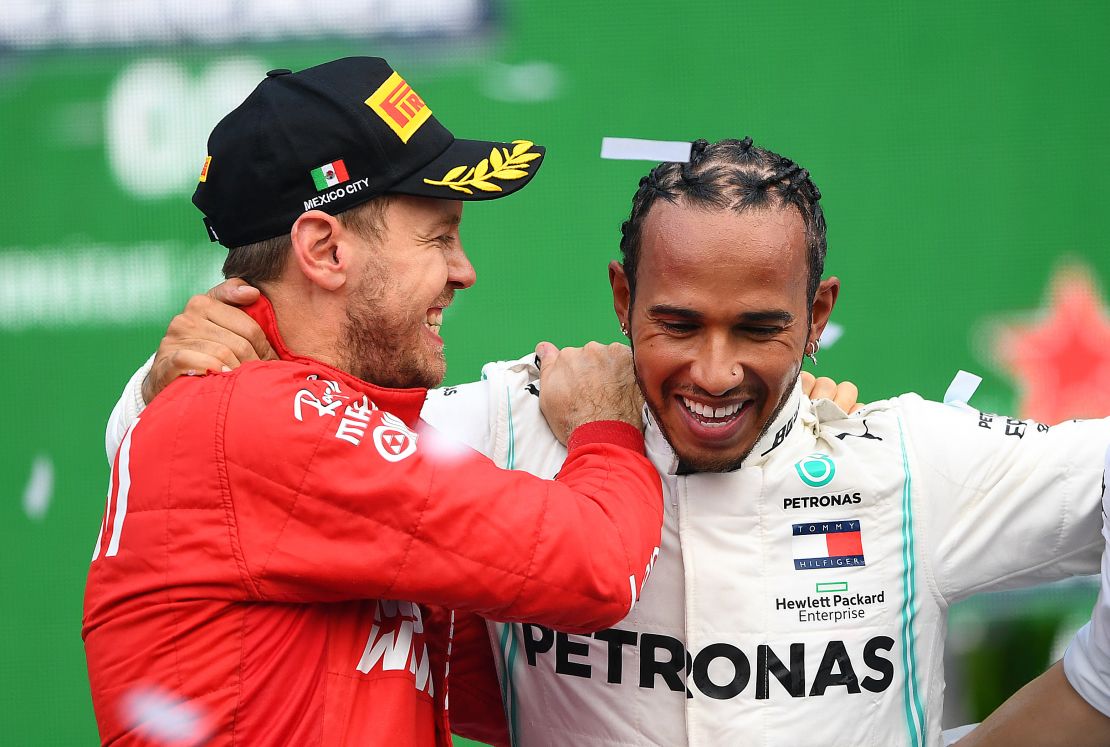 Vettel and Hamilton celebrate on the podium after the Mexican Grand Prix.