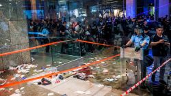 Blood and debris are seen on the ground at the entrance of a shopping mall as riot police secure the scene after a bloody knife fight broke out in Hong Kong on November 3, 2019. - A bloody knife fight in Hong Kong left six people wounded on November 3 evening, including a local pro-democracy politician who had his ear bitten off, capping another chaotic day of political unrest in the city. (Photo by VIVEK PRAKASH / AFP) (Photo by VIVEK PRAKASH/AFP via Getty Images)