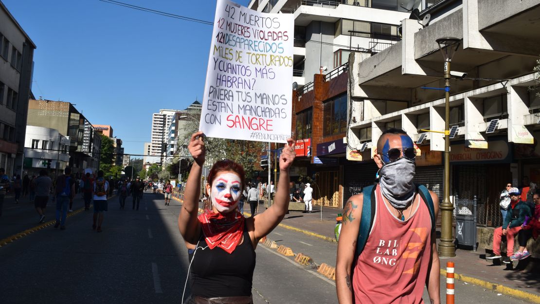 Valentina Alvarez captured a protester in Joker makeup at a protest in Concepción, Chile, on October 24.