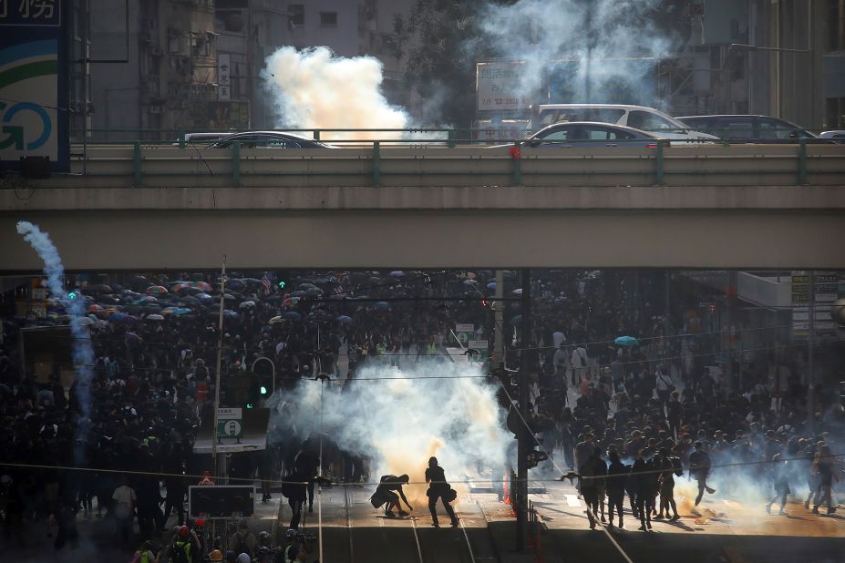 Thousands of black-clad masked protesters streamed into Hong Kong's central shopping district for another rally on November 2.