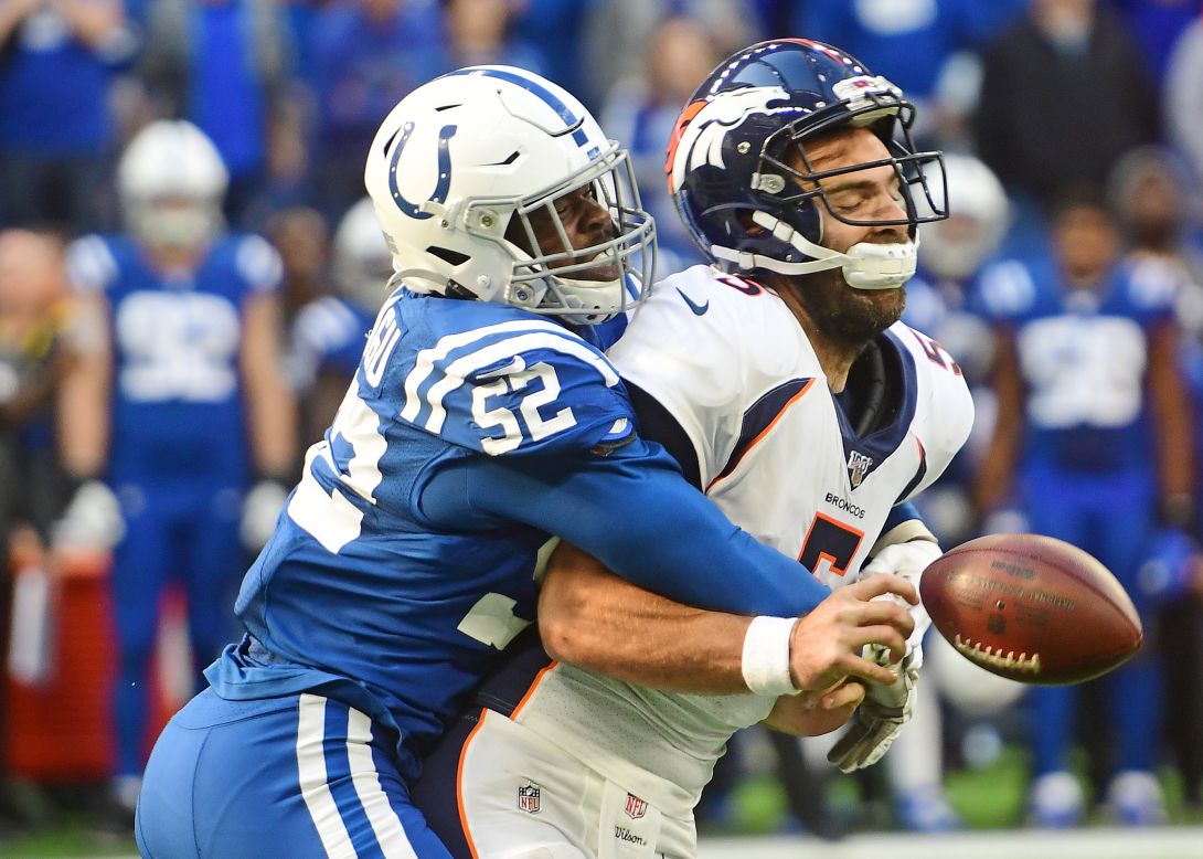 Colts defensive end Ben Banogu sacks Denver Broncos quarterback Joe Flacco during the fourth quarter on Sunday, October 27 in Indianapolis, Indiana.