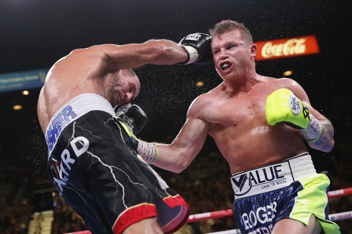 Canelo Alvarez, right, lands a punch against Sergey Kovalev during a World Boxing Organization light heavyweight match on Saturday, November 2, in Las Vegas, Nevada. Alvarez is the fourth Mexican fighter to win titles in four weight divisions.<br />