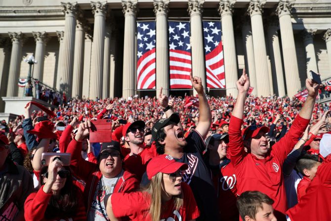 Fans <a href="index.php?page=&url=https%3A%2F%2Fwww.cnn.com%2F2019%2F11%2F02%2Fus%2Fwashington-nationals-parade-trnd%2Findex.html" target="_blank">celebrate the Washington Nationals</a> during the World Series championship parade and rally in Washington, D.C., on Saturday, November 2.