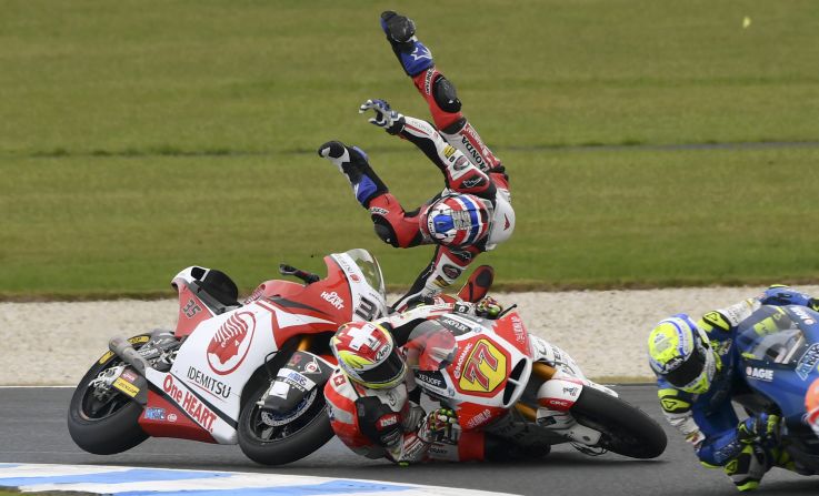 Idemitsu Honda Team Asia rider Somkiat Chantra of Thailand ﬂies over MV Agusta Temporary Forward rider Dominique Aegerter of Switzerland during the Moto2 Australian Grand Prix motorcycle race at Phillip Island on Sunday, October 27.