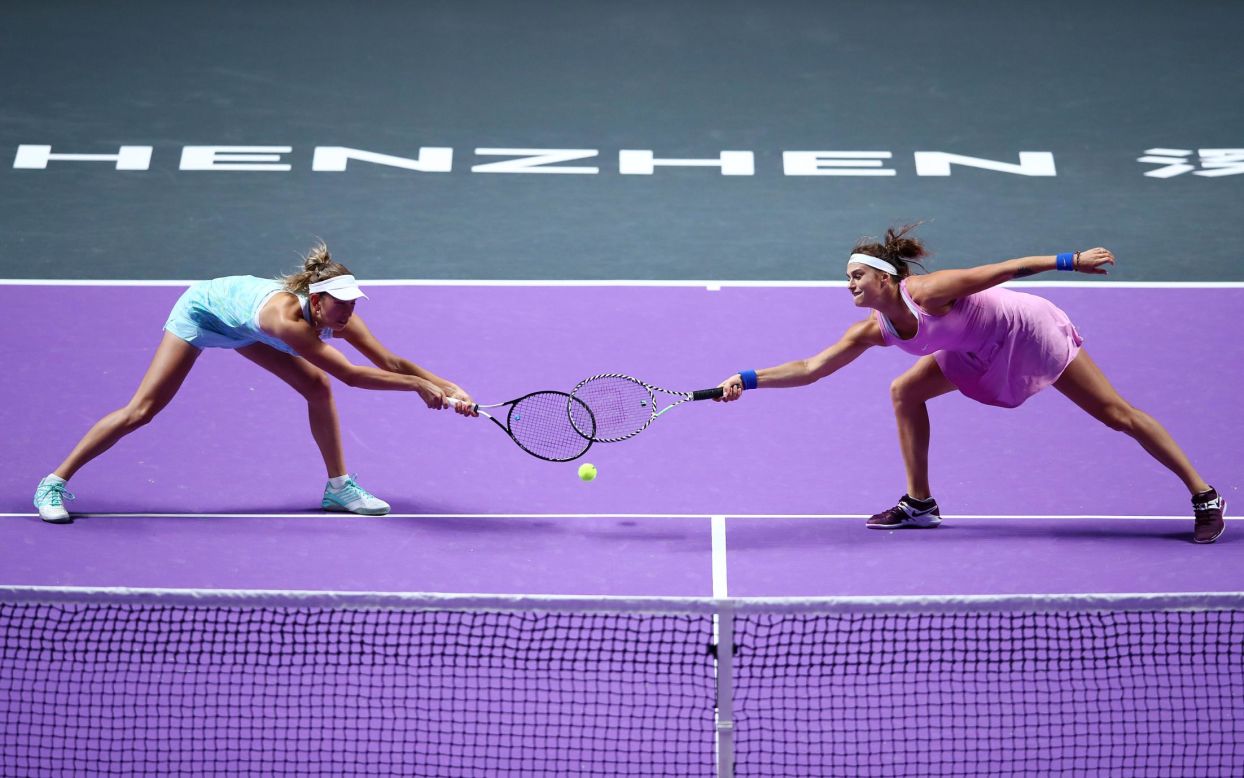 Belarusian tennis player Aryna Sabalenka and Elise Mertens of Belgium return the ball during their Women's Doubles match during the Women's Tennis Association Finals in Shenzhen, China on on Monday, October 28. 