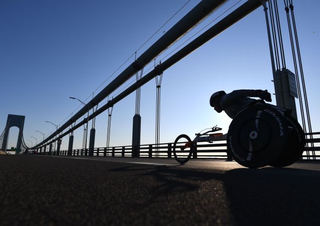 A wheelchair racer crosses the Verrazzano-Narrows Bridge during the New York City marathon in Manhattan on Sunday, November 3.