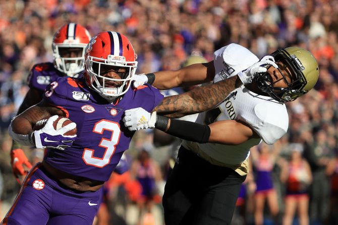 Clemson wide receiver Amari Rodgers stiff arms Wofford's Miller Mosley at Memorial Stadium on Saturday, November 2, in Clemson, South Carolina. The Tigers defeated the Terriers 59-14. 