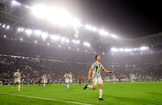 Juventus' Cristiano Ronaldo celebrates scoring the second goal of the game against Genoa at Allianz Stadium in Turin, Italy on Wednesday, October 30. 