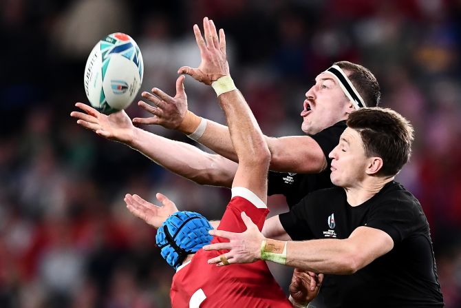 Justin Tipuric of Wales fights for the ball against New Zealand's Brodie Reallick and Beauden Barrett during the World Cup bronze final match in Tokyo, Japan, on Friday, November 1. New Zealand won 40-17.