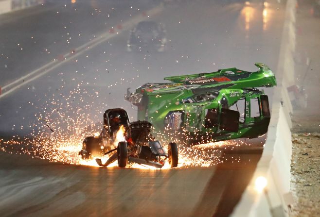 Top Alcohol Funny Car driver Doug Gordon crashes during a drag race at The Strip at Las Vegas Motor Speedway in Nevada on Friday, November 1. Gordon walked away from the crash uninjured. 