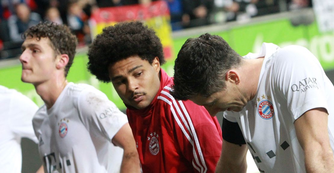 Bayern Munich players react after their side's 5-1 hammering against Eintracht Frankfurt, the team's second league defeat.