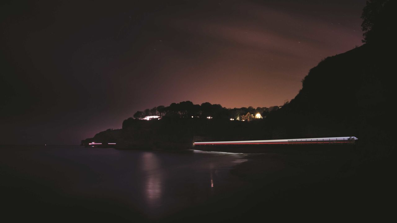 <strong>Long exposure</strong>: A long exposure photo shows a British Rail Class 253 high speed train as it passes Coryton's Cove, Dawlish in the coastal region of Devon. "The objective of long exposure is to capture a sense of movement, not to record only a static scene," says Coombes.
