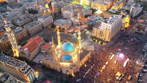 An aerial view shows thousands of Lebanese protesters gathered in Beirut's downtown district on Sunday.