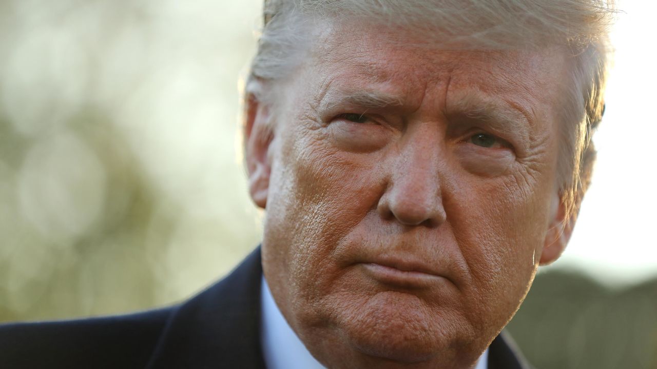 President Donald Trump talks to reporters before departing the White House, November 1.