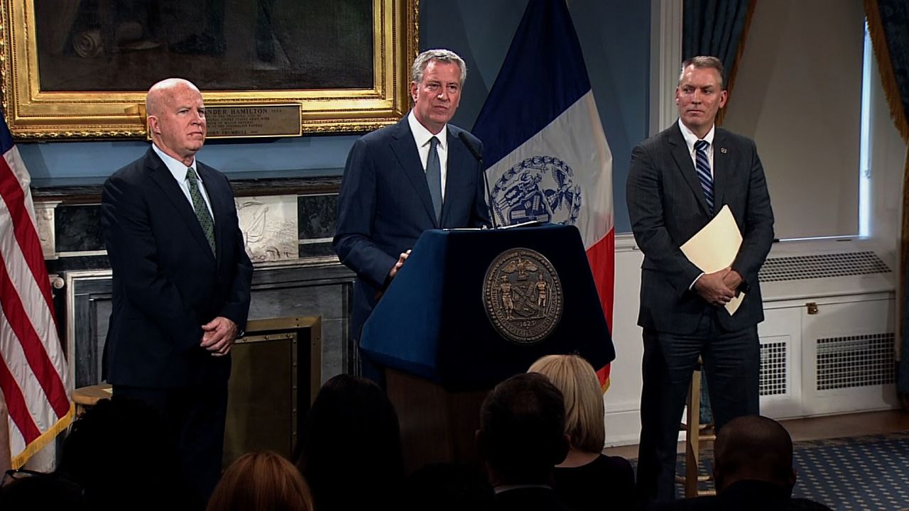 Outgoing NYPD Commissioner James O'Neill, Mayor Bill de Blasio and incoming commisioner Dermot Shea (from left to right) announced the changing of the guard on November 4.