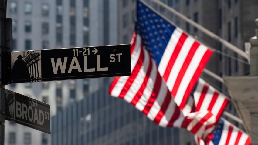 The US flag flies outside the New York Stock Exchange on March 11, 2019 in New York. - The benchmark Dow Jones Industrial Average was flat midmorning, recovering from steep early losses driven by tumbling shares in US aviation giant Boeing following Sunday's fatal crash in Ethiopia. Around 1430, Boeing shares were down 8.4 percent at $387.01, up from the steeper plunge before the market open following the fatal crash of the Ethiopian Airlines Flight ET302 -- the second involving a Boeing 737 Max 8 in five months. (Photo by Don Emmert / AFP)        (Photo credit should read DON EMMERT/AFP via Getty Images)