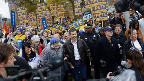 Democratic presidential candidate, South Bend, Indiana, Mayor Pete Buttigieg walks with his husband Chasten Buttigieg before the Iowa Democratic Party Liberty & Justice Celebration on November 1, 2019 in Des Moines, Iowa.