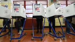 Voters cast their ballots at voting booths on November 8, 2016 in New York, United States. 