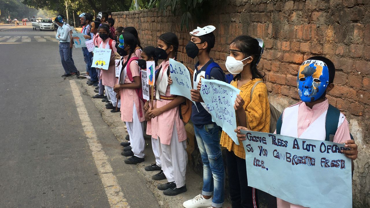 Schoolchildren protest outside the Indian Environment Ministry against alarming levels of pollution in New Delhi, India, on November 5, 2019. 
