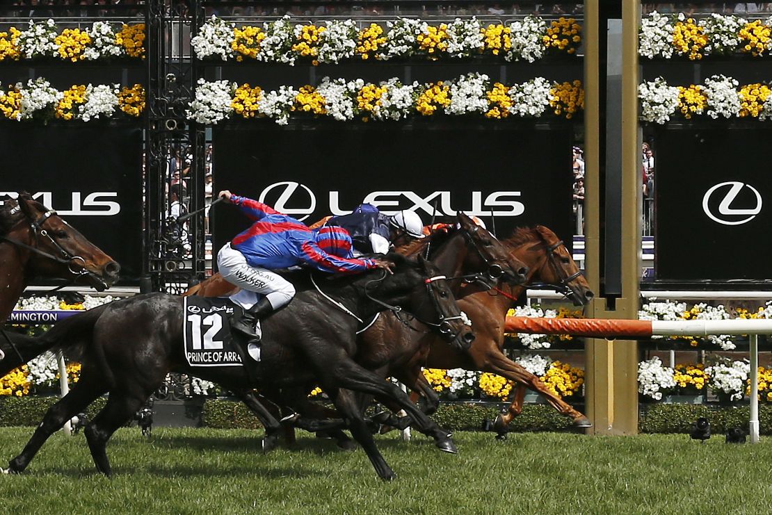 Craig Williams rides Vow and Declare (right) to win the 2019 Lexus Melbourne Cup at Flemington.