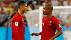 Portugal's forward Cristiano Ronaldo (L) speaks with Portugal's midfielder Joao Mario during the Russia 2018 World Cup Group B football match between Iran and Portugal at the Mordovia Arena in Saransk on June 25, 2018. (Photo by Jack GUEZ / AFP) / RESTRICTED TO EDITORIAL USE - NO MOBILE PUSH ALERTS/DOWNLOADS        (Photo credit should read JACK GUEZ/AFP via Getty Images)