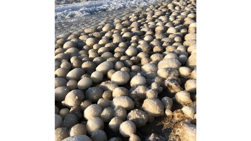 Tarja Terentjeff shot these photos  of ice balls that formed on the beach in Hailuoto, Finland, an island in the Black Sea. "The whole beach was full of these ice balls," she said. Terentjeff says she loves taking nature photos and visits the island from time to time because of its beauty. This was amazing phenomenon, never seen before. The whole beach was full of these ice balls. The island of Hailuoto is about 30 min ferry drive from city of Oulu. I took these photos today. First they have been soft balls but yesterday it was -18 and all of these were frozen, icy balls! I have no idea how phenomenon has happened!      There have been a lot of moist and frost in the area right now. Today weather was amazing by the sea, no wind, nice, warm and synny Finnish November day! Sure, you can use my pictures with my name. Can I help you any other ways?