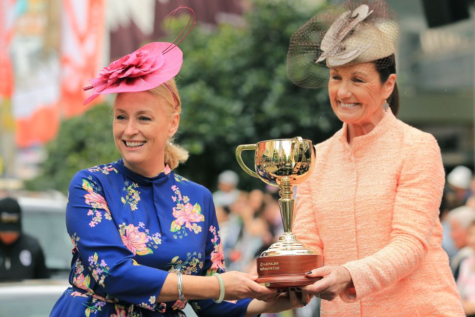 Melbourne Lord Mayor Sally Capp (left) and Victoria Racing Club Chairman Amanda Elliott hold the Melbourne Cup during the Parade.