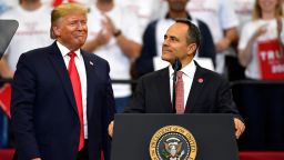 Kentucky Gov. Matt Bevin, right, looks out at the crowd as President Donald Trump watches during a campaign rally in Lexington, Kentucky, Monday, November 4.
