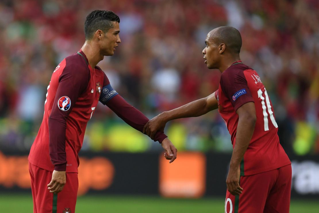 Ronaldo (left) talks with Mario (right) during the Euro 2016 final against France.