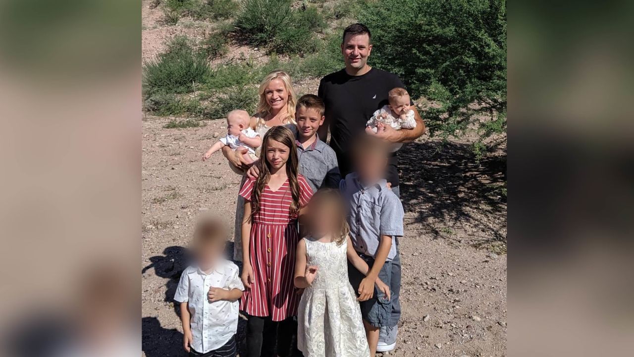 Howard Miller, the man in the black shirt, and the three children with blurred faces survived the attack. The five others were killed.