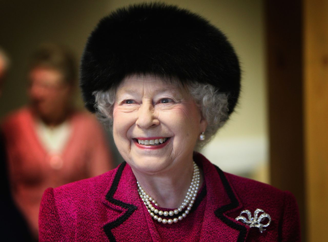 Queen Elizabeth II is taken on a tour of the Carole Brown Health Centre on February 3, 2009 in Dersingham, England.