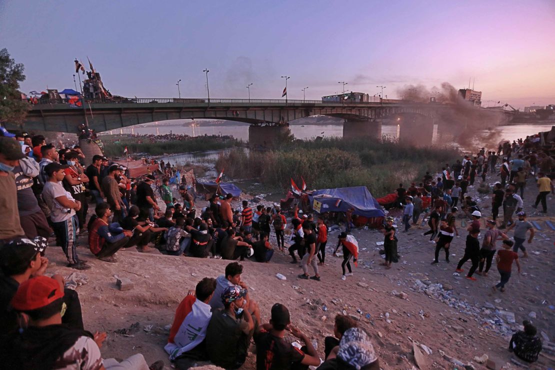 Protesters stage a sit-in around a bridge leading to the Green Zone government areas in Baghdad on  November 5.