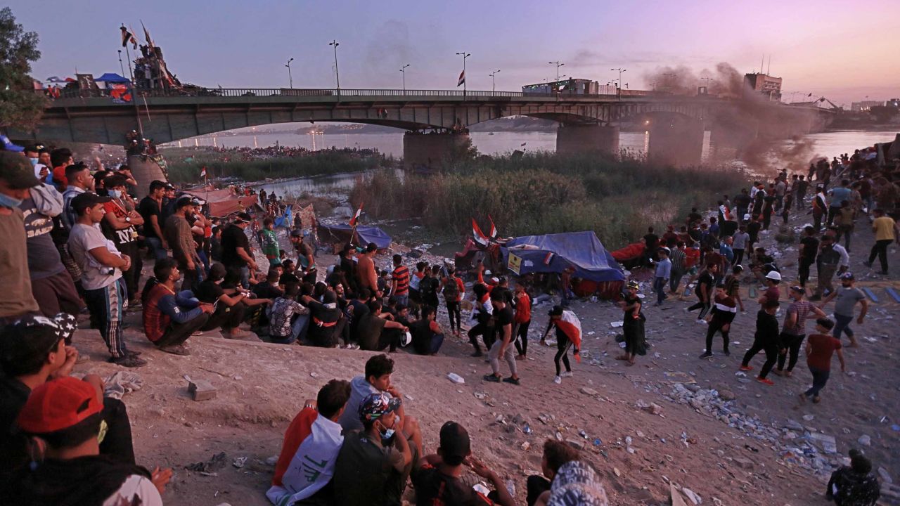 Protesters stage a sit-in around a bridge leading to the Green Zone government areas in Baghdad on  November 5.