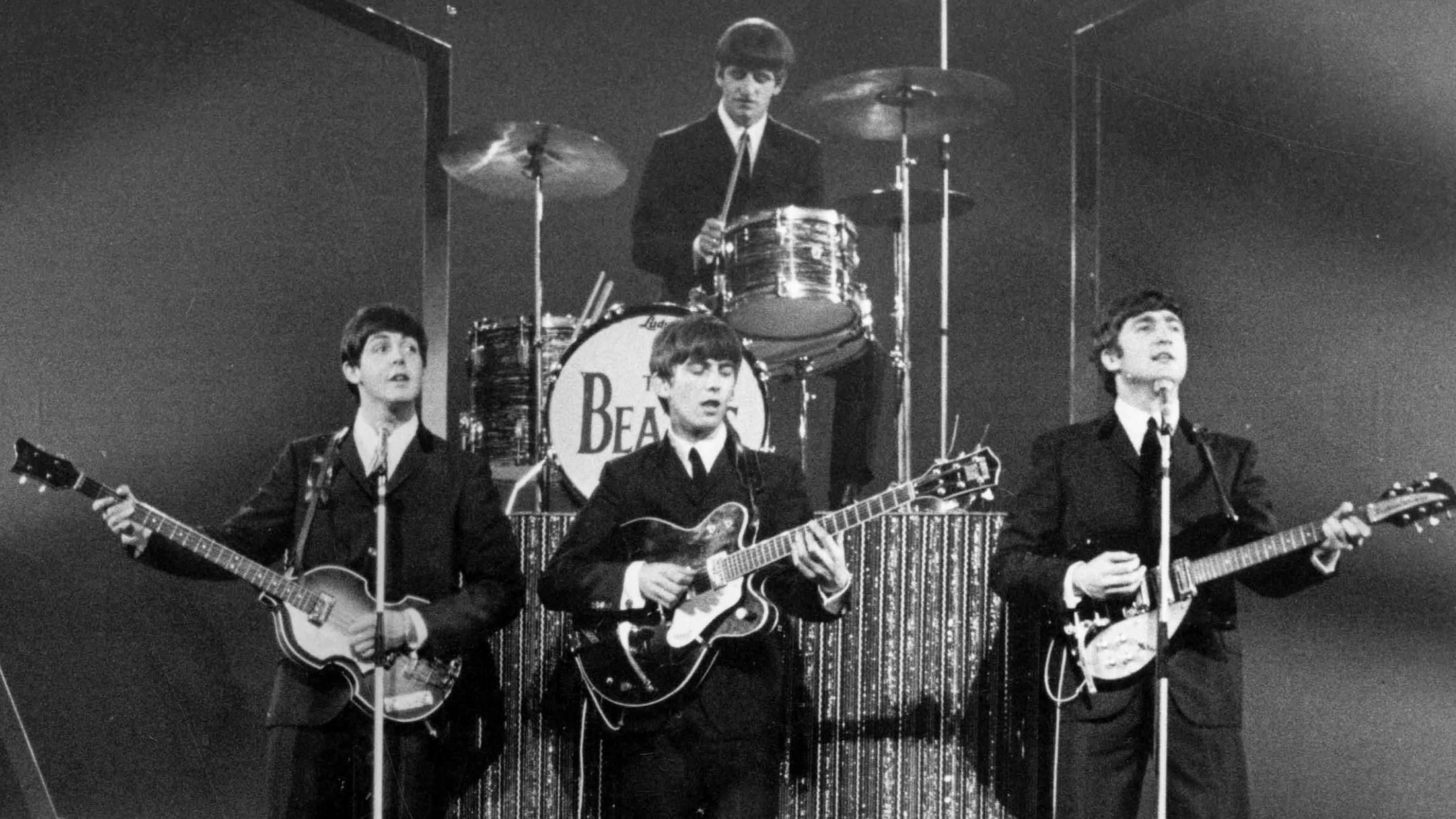 The Beatles on stage at the London Palladium.
