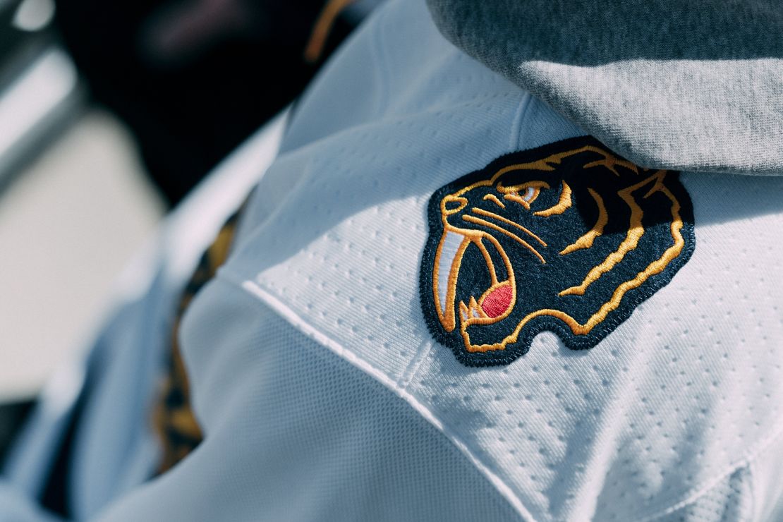 The new Predators jersey features a retro saber-toothed tiger, the team's mascot, on one shoulder.