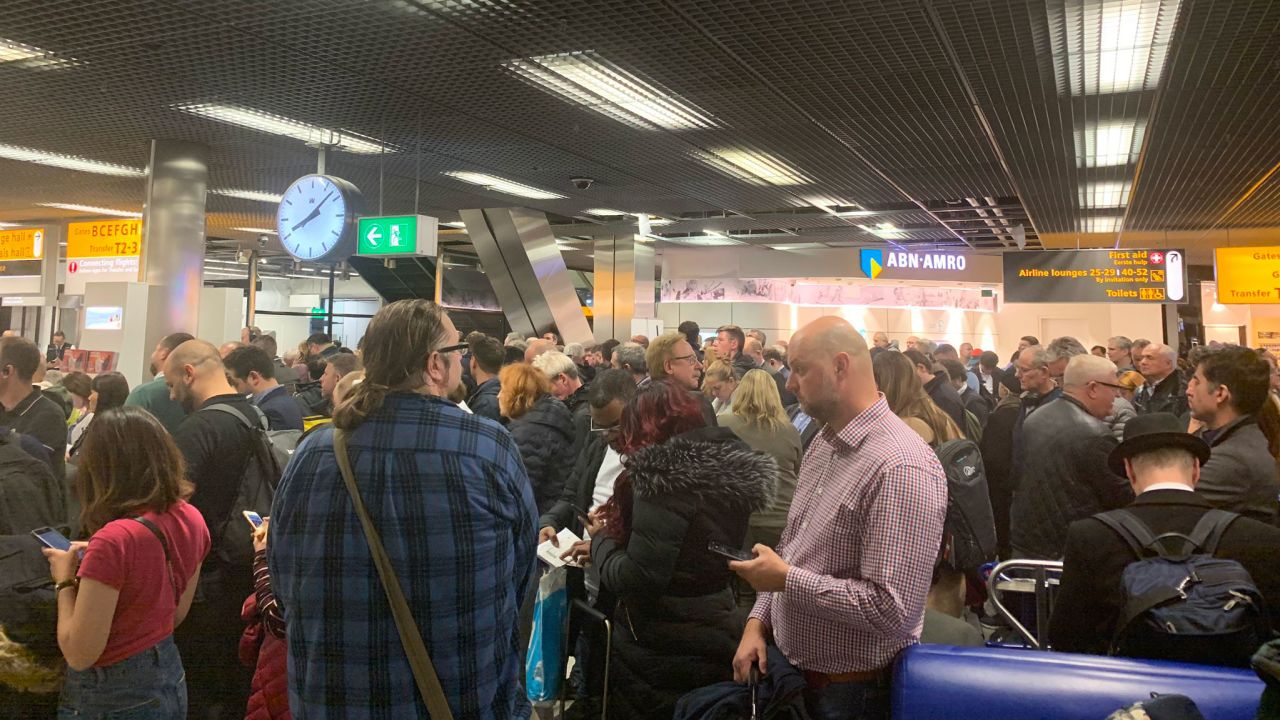 Mark Crompton shared a photo from Amsterdam's Schiphol Airport of large crowds and confusion amid the suspicious situation at the airport.