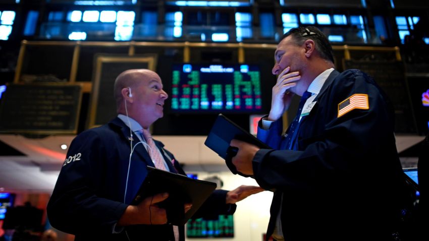 Traders work during the opening bell at the New York Stock Exchange (NYSE) on November 4, 2019 at Wall Street in New York City. - Wall Street stocks added to records early Monday, boosted by optimism over US-China trade talks, while McDonald's retreated on an executive shakeup. Analysts cited remarks from US Commerce Secretary Wilbur Ross that "phase one" of the trade agreement between Beijing and Washington was on track."The news seems to be getting good," J.J. Kinahan, chief market strategist at TD Ameritrade, said of the trade developments. (Photo by Johannes EISELE / AFP) (Photo by JOHANNES EISELE/AFP via Getty Images)