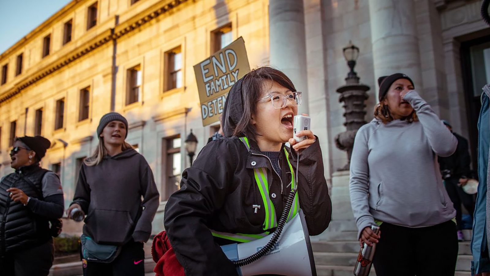Carolina Fung Feng, 30, leads protesters in a chant in Media, Pennsylvania. Fung Feng is among the DACA recipients who are suing the government over the administration's decision to end the program.
