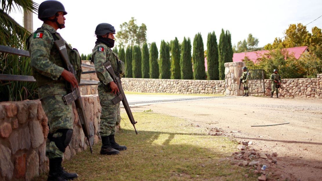 Soldiers keep watch outside the properties of Mexican-American Mormons in Bavispe and LaMora on November 6, 2019. 