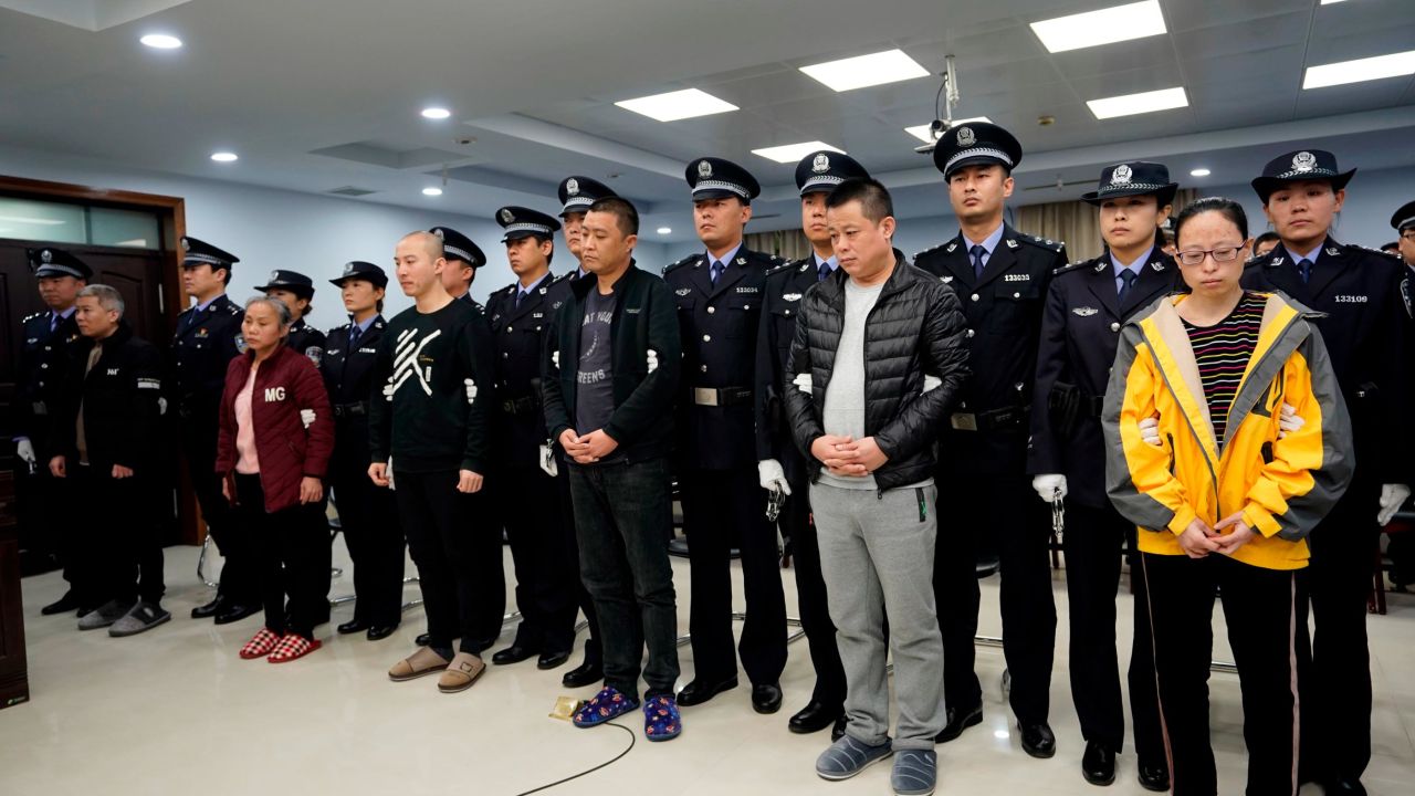 The defendants in Thursday's court case in Hebei, who were accused of being part of a fentanyl smuggling ring.