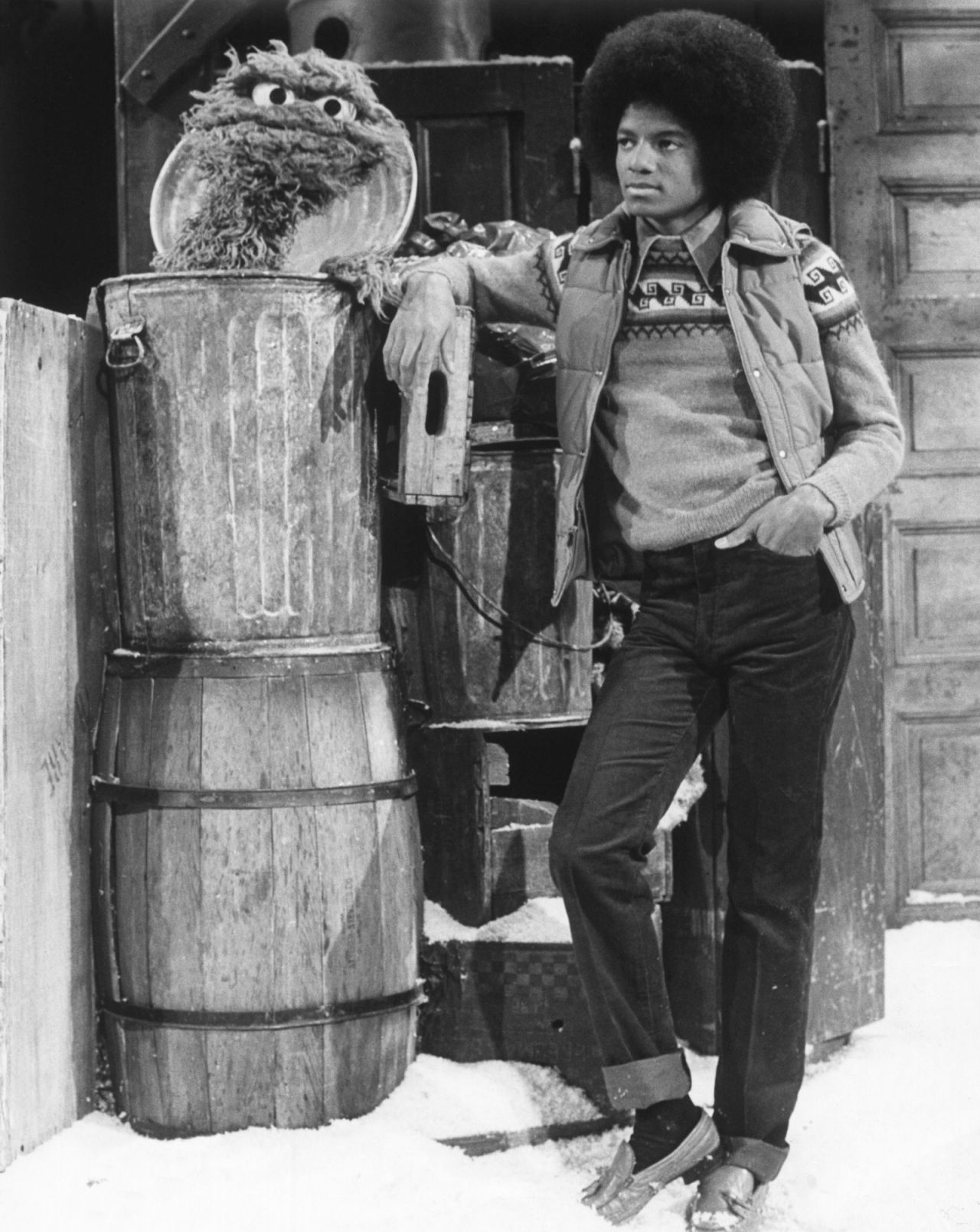 Michael Jackson, the "King of Pop," hangs out with Oscar the Grouch on a "Sesame Street" Christmas special in 1978.