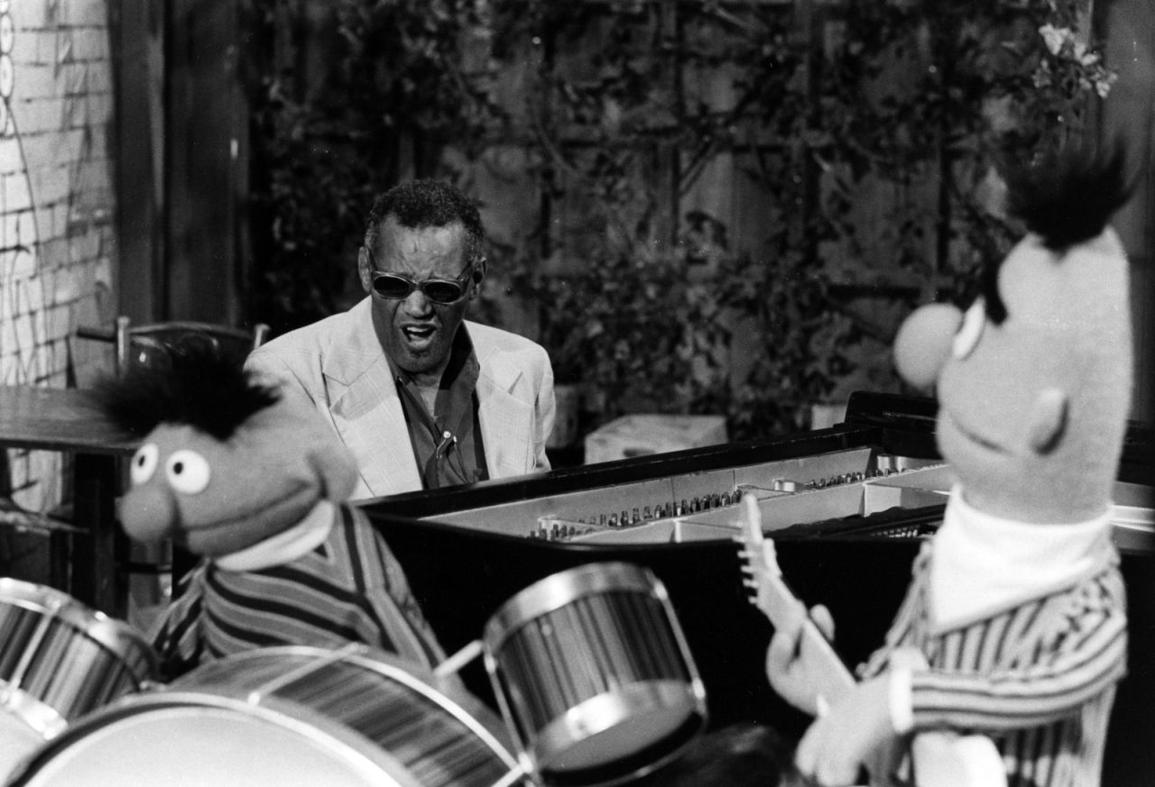 Ray Charles plays music with Bert and Ernie on a "Sesame Street" episode in 1977. Charles appeared on numerous episodes throughout his life.
