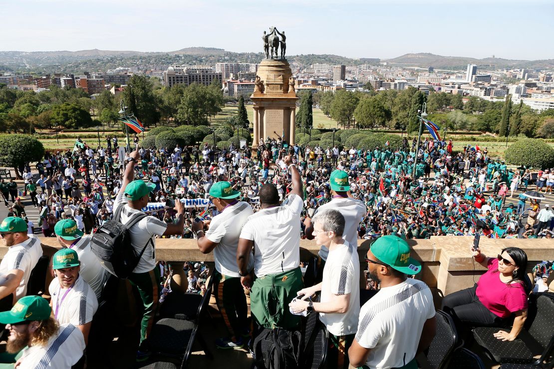 Springbok players celebrate from the Union Buildings, the seat of South Africa's government, before the start of their nation-wide trophy tour that will see the players engage with fans in Pretoria, Johannesburg, Soweto, Durban, East London, Port Elizabeth and Cape Town. 