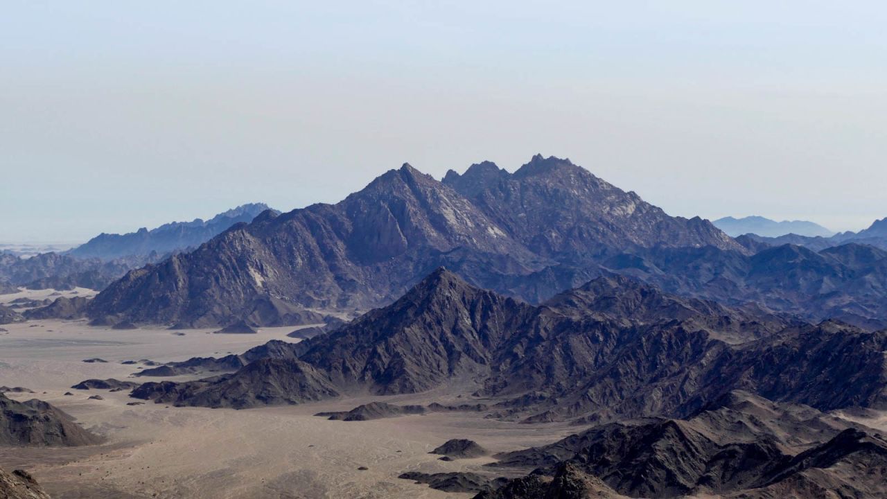 The rugged peaks of Jebel Um Anab, with Wadi Abu Abid below. This is the first peak hikers climb when traversing the Red Sea Mountain Trail.