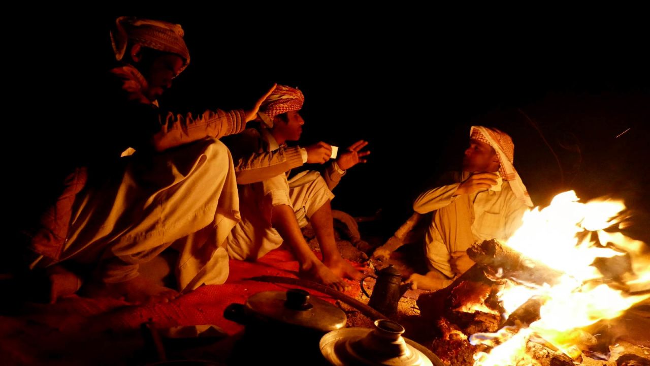 Bedouin guides of the Maaza on a cold winter's night on the Red Sea Mountain Trail, telling stories by the fire.