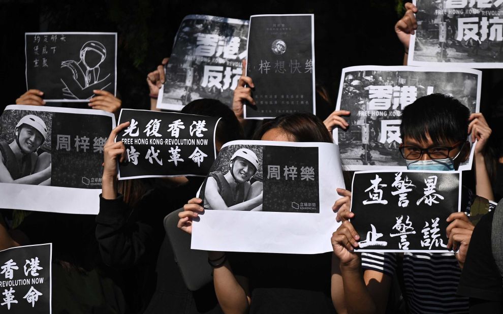 Students of the Hong Kong University of Science and Technology (HKUST) participate in a march on November 8, after hospital officials confirmed the <a href="https://edition.cnn.com/2019/11/07/asia/hong-kong-protester-death-intl-hnk/index.html" target="_blank">death of student Chow Tsz-lok</a>, 22. Police say Chow, a computer sciences student at HKUST, fell from the third floor to the second floor of a parking garage in the residential area of Tseung Kwan O in the early hours of November 4.