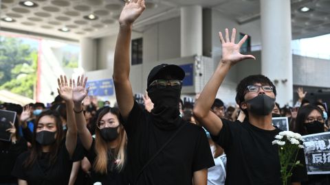 Students of the Hong Kong University of Science and Technology (HKUST) participate in a march towards HKUST president Wei Shyy's lodge in Hong Kong on November 8, 2019, following the death earlier in the day of student Chow Tsz-lok. 