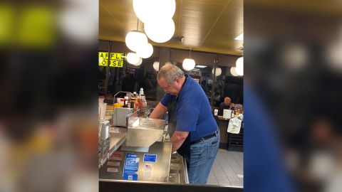 Crispo never got the man's name, but this man stepped in to serve behind the counter when an Alabama Waffle House had a staff shortage.