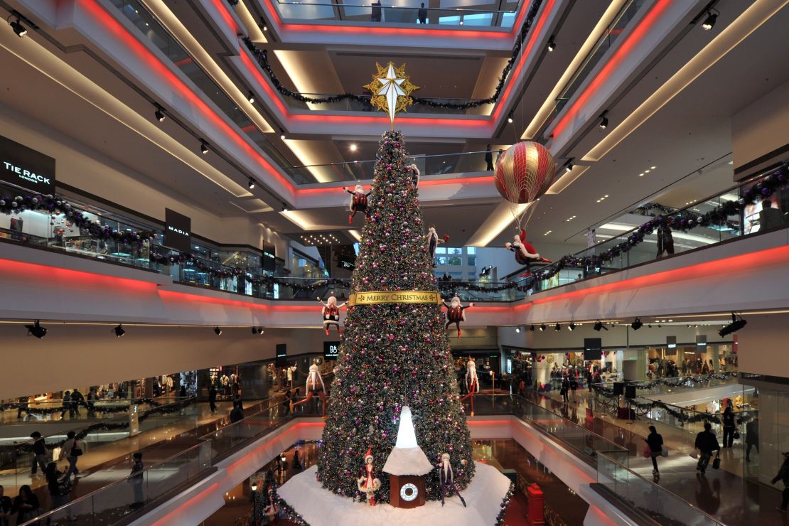 A four story-tall Christmas tree is seen in a shopping mall in the Kowloon Tong region of Hong Kong on December 5, 2011. 