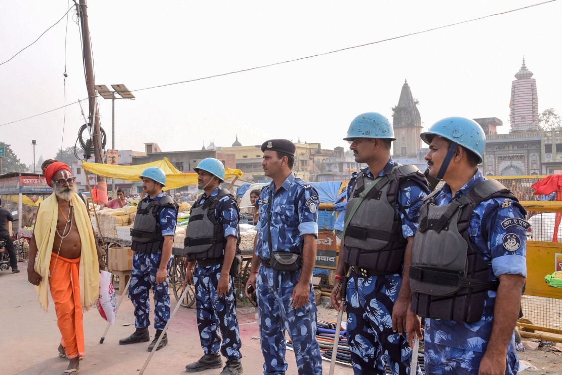 Security personnel stand guard on a street in Ayodhya on November 7, 2019, ahead of a Supreme Court verdict on the future of the site of the 16th-century Babri mosque.